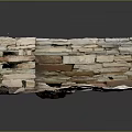 Ancient Stone Wall Corner with Stacked Stones and Scattered Debris on Ground