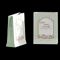 Light Green Gift Bag With Pink Floral Pattern Decorative Border And Logo Design