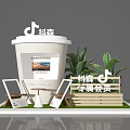 Creative Photo Check In Spot With Large Milk Tea Cup Green Plants And Photo Frames