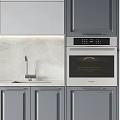 Modern Kitchen With Stylish Gray And White Cabinets Featuring Marble Countertops And Built In Appliances