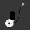 Electric Motor With Silver Metal Housing Black Cylindrical Body And Wiring Harness Connector