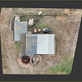 Rustic Barn Structure With Metal Roof Red And Gray Silos Wooden Fence Dirt And Grass