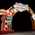 Illuminated Las Vegas Welcome Arch With Playing Cards Dice Motel Signs And Checkered Decorations