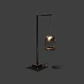 Decorative Brass Birdcage Hanging On Black Metal Stand With Square Base