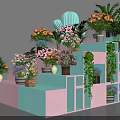 Floral Shop In Mall With Colorful Step Display Shelves And Various Potted Plants
