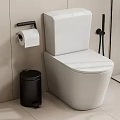 White Modern Toilet with Toilet Paper Holder and Black Trash Bin in Contemporary Bathroom Interior