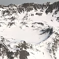 Majestic Snow Covered Mountain Terrain With Rocky Peaks And White Snow