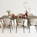 Outdoor Dining Table with Wooden Tabletop Metal Frame Chairs Vase and Fruit Decor
