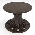 Round Brown Dining Table With Intricate Root Like Base And Carved Details