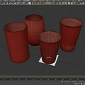 Four Transparent Glass Cups With Various Shapes And Designs On Smooth Surface
