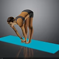 A Woman Doing Forward Bend Exercise On Blue Yoga Mat In Activewear