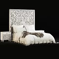 Double Bed With Intricate Carved White Headboard White Bedding And Fur Throw
