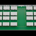 Neatly Arranged White Reception Desks On Green Floor In Exhibition Hall