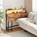 Cozy Living Room with Wooden Sideboard Warm Lighting Beige Sofa and Green Plant