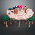 Round Wooden Outdoor Table Decorated With Green Leaf Shaped Stools Pink Flower Mug And Plates