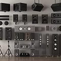 Various Styles Of Audio Speakers Including Floor Standing Bookshelf Wall Mounted And Stand Models