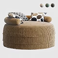 Brown pleated round bean bag chair with geometric pattern pillows and cozy design
