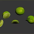 Fresh Green Limes With Whole And Sliced Pieces On Dark Surface