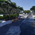 Serene Garden Landscape With Red Maple Trees Hedges White Seats And Stone Ground
