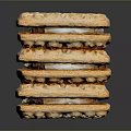 Stacked Crispy Crackers With Textured Surface And Golden Brown Layers