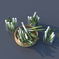Fresh Green And White Scallions In Wicker Basket And Metal Mesh Baskets On Gray Background