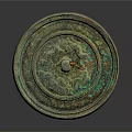 Antique Bronze Mirror Carved Sculpture with Intricate Decorative Patterns and Circular Design