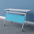 White Tabletop Desk With Blue Panel Sturdy White Frame And Wheels On Gray Floor