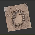 Square Platform Featuring Circular Stone Arrangement On Sandy Ground With Scattered Stones
