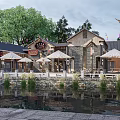 Charming Traditional Chinese Commercial Street With Outdoor Seating Umbrellas Waterfront Trees