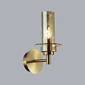 Modern Brass Wall Lamp With Transparent Glass Shade And Exposed Bulb Decorative Design
