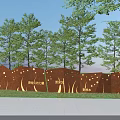Outdoor Scenic Wall with Illuminated Engraved Characters Surrounded by Green Trees in Public Area