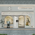 SPA MANA Shopping Mall Storefront With White Arched Doorways Green Plants And Stone Lion