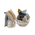 Woven Storage Basket Filled With Colorful Fabric Items And Geometric Patterns