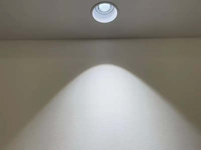 Modern Recessed Downlight Spotlight Installed in Ceiling Illuminating White Wall with Soft Light Beam 3d model