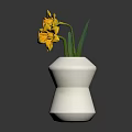 Yellow Daffodils With Green Leaves Arranged In White Modern Vase Decoration