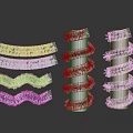 Festive Decorative Column Furniture Design With Spiral Green Garland And Colorful Lights