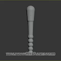 Ornate Metallic Weapon With Intricate Filigree Base And Silver Handle Design