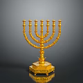 Golden Menorah With Intricate Design And Decorative Base On Black Background