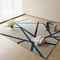 Square Rug with Modern Geometric Design Blue Black Lines on Wooden Floor and White Vase