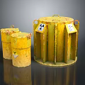 Yellow Rusty Radioactive Waste Barrels With Radiation Warning Signs For Storing Hazardous Materials