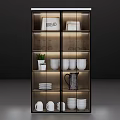 Modern Display Cabinet Interior With Bread Bowls Mugs Glassware And Small Plant