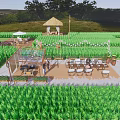 Rural Countryside Landscape with Green Fields Thatched Pavilion and Outdoor Seating Area