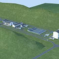 Industrial Factory Complex In Lush Green Hills With Modern Buildings Roads And Facilities