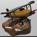 Yellow Biplane Airplane Model With Silver Wings Red Propeller And Wheels On Wooden Base