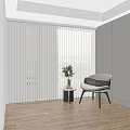 White Window Blinds in Bright Room Interior With White Chair Small Table and Wooden Floor
