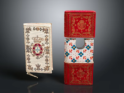 Red And Beige Decorative Books With Floral And Ornamental Patterns 3d model