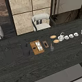 Traditional Tea Set With Teapot Cups And Wooden Tray On Table With Flowers And Book