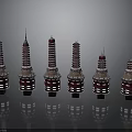 Six Red And White Layered Towers With Circular Base Spire And Reflections On Black Background