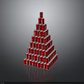 Red Cans Stacked In Pyramid Shape Tower Display On Black Surface
