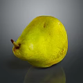 Yellow Ripe Fresh Juicy Pear on Dark Background with Shiny Surface